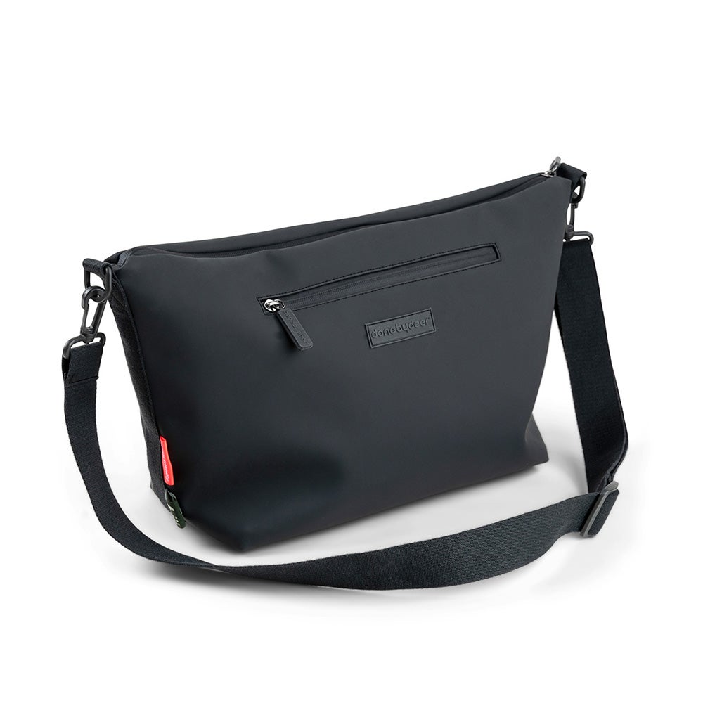 Done by Deer barnevogn bag sort
