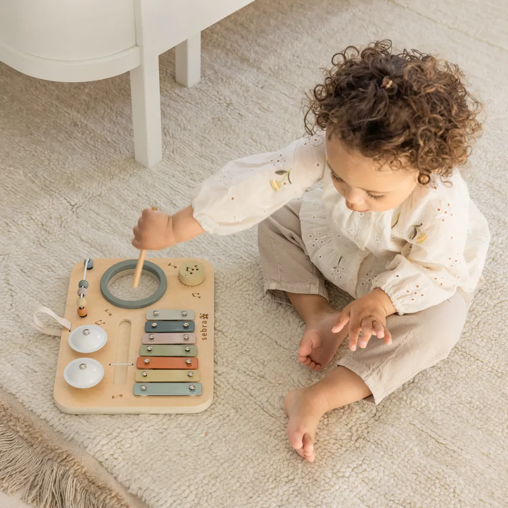 Sebra musikalsk aktivitetspanel i tre