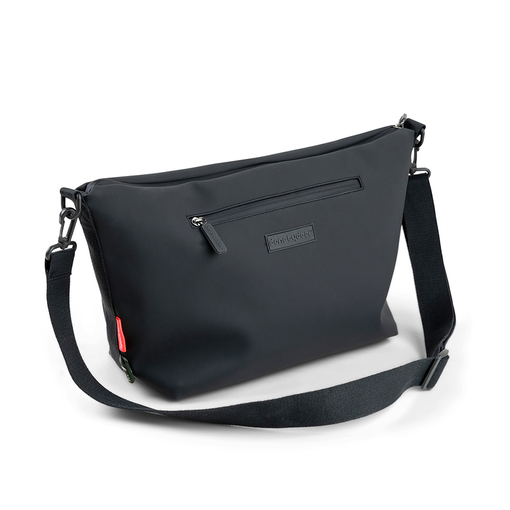 Done by Deer barnevogn bag sort