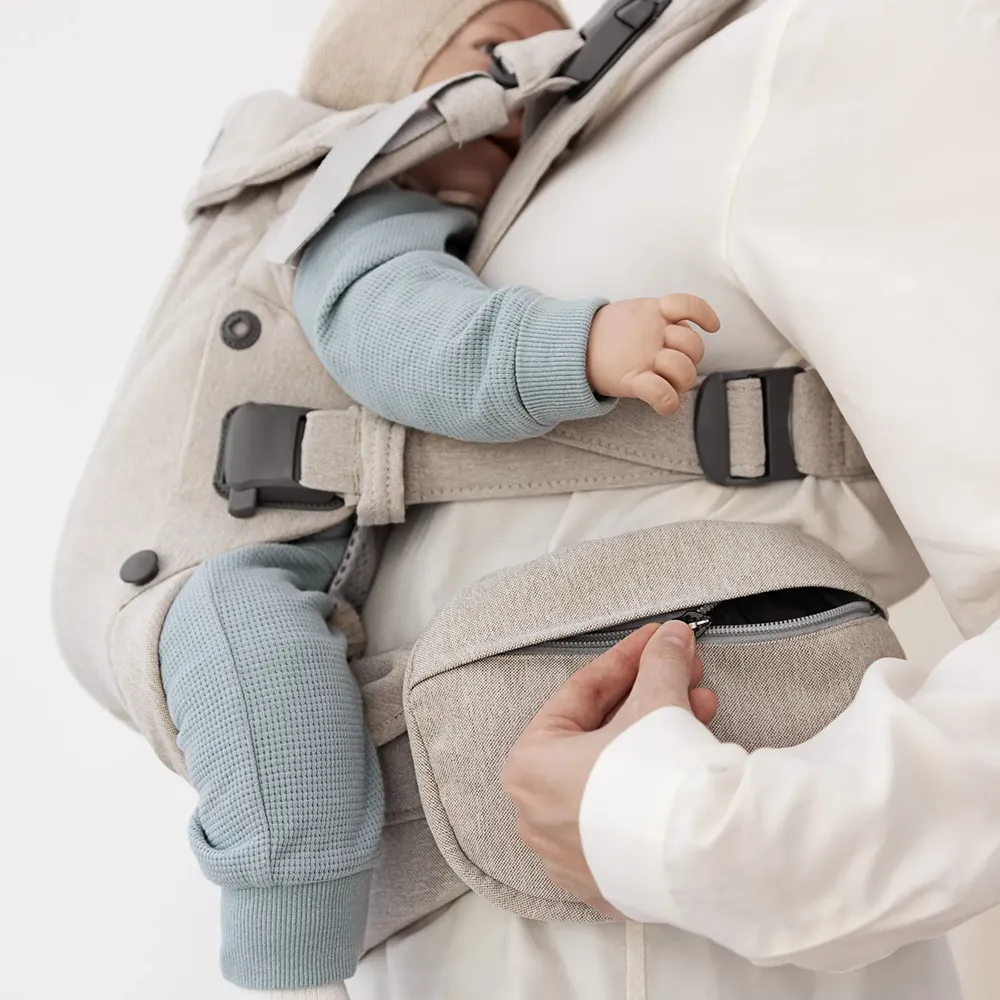 Babybjörn Oppbevaringslomme for bæresele Vevd melange Light Beige